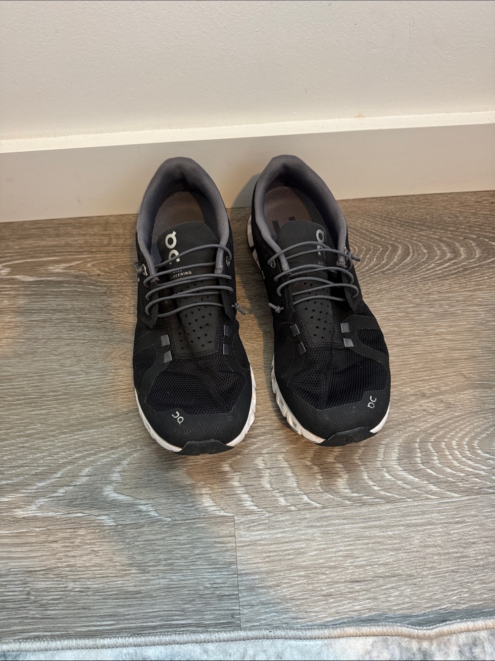 On Running Women's Cloud Sneakers in Black and Gray